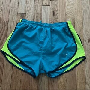Nike Dry Standards Fit Women’s Short Size Medium. Turquoise and high vis yellow